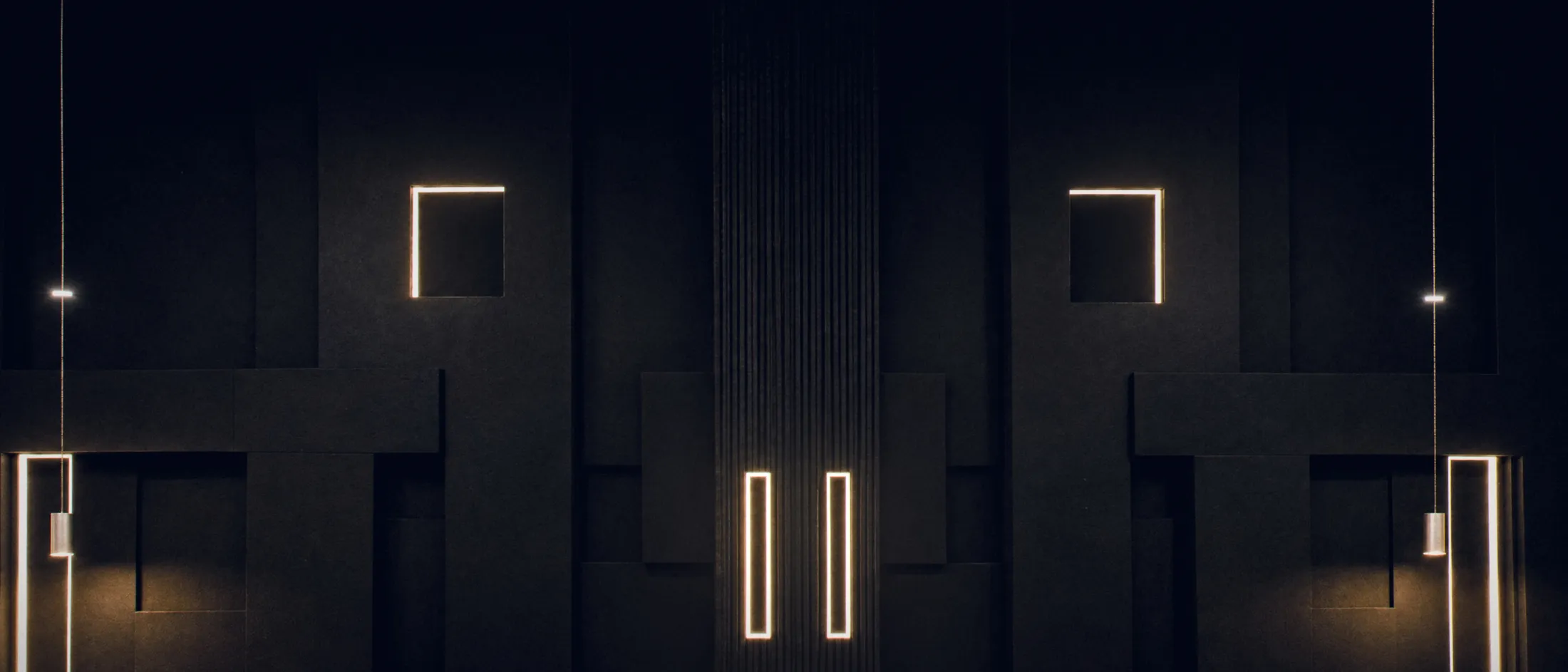 Dark headboard wall with lines of light