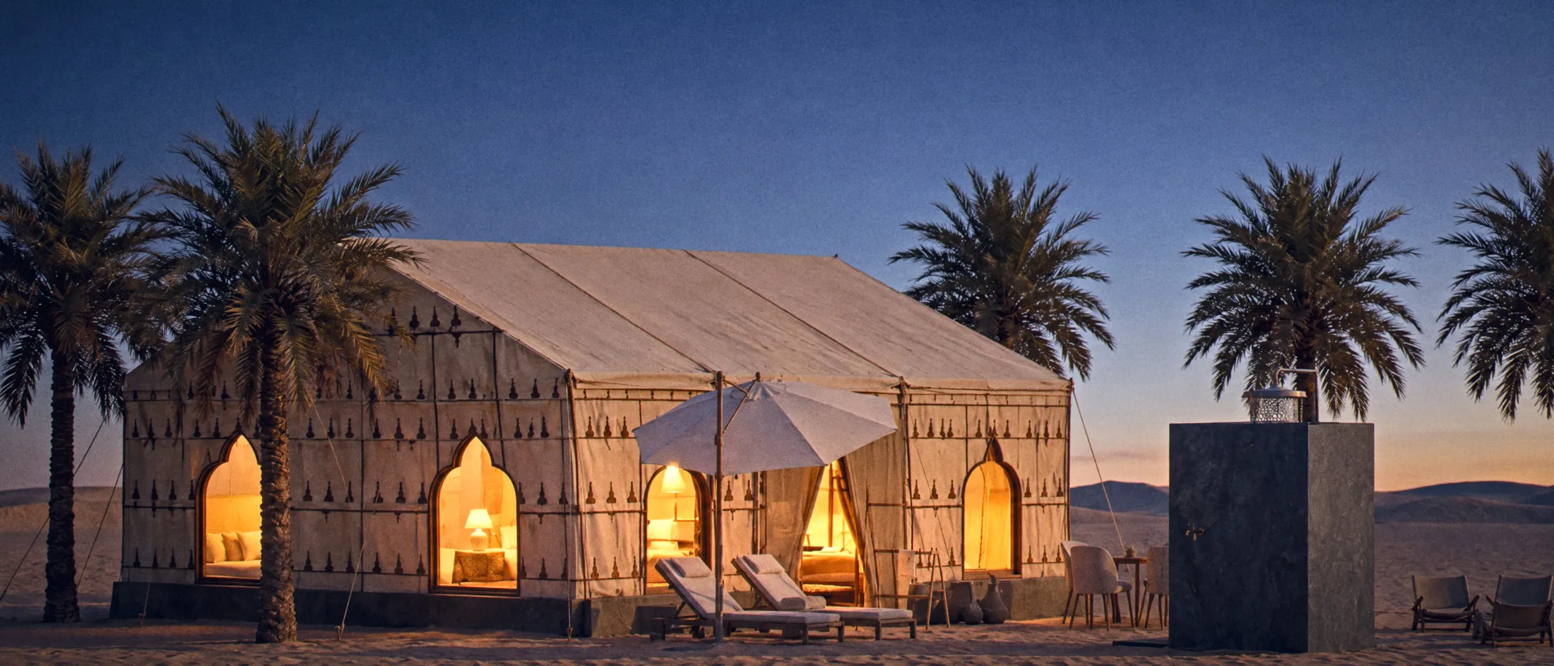 Moroccan canvas haima among date palms, its arched windows glowing at dusk